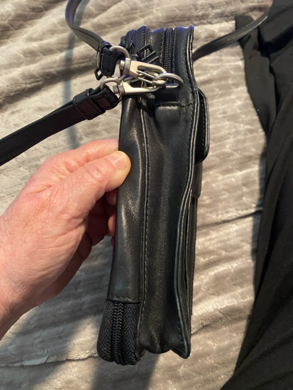 TUMI Black Leather Messenger Bag with Silver Hardware